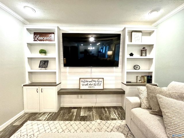 living area featuring a textured ceiling, ornamental molding, dark wood finished floors, and baseboards