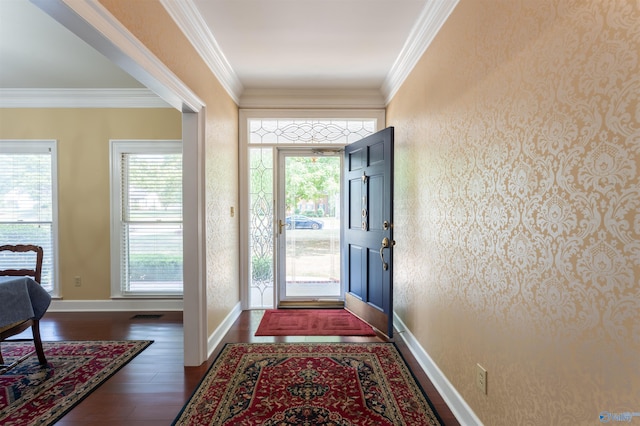 entrance foyer featuring dark hardwood / wood-style floors and crown molding