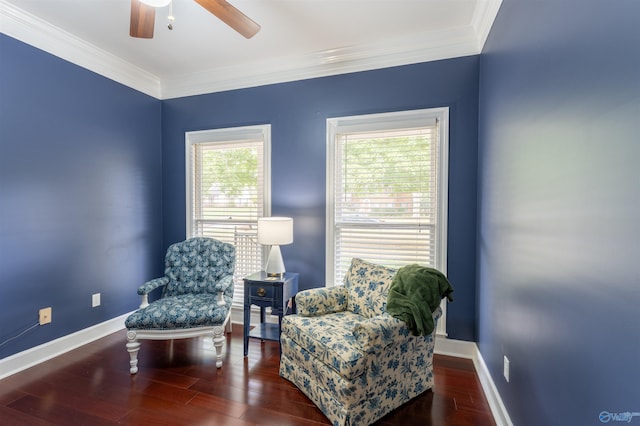 sitting room featuring ornamental molding, dark hardwood / wood-style flooring, and ceiling fan