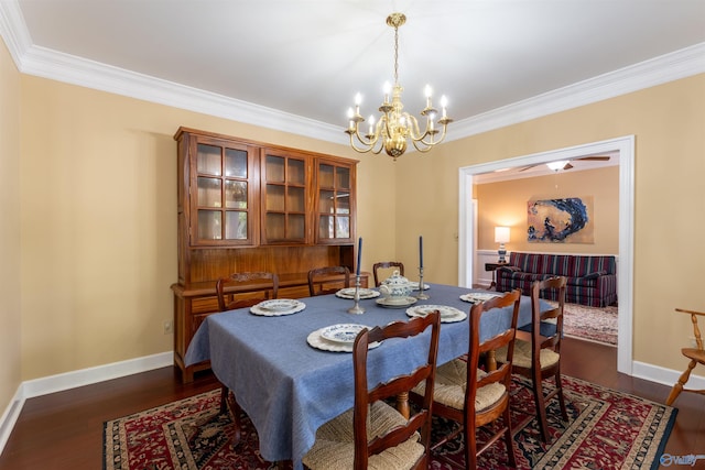 dining space featuring an inviting chandelier, dark wood-type flooring, and crown molding