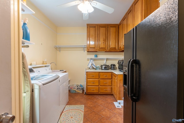 laundry area featuring washer and dryer, light tile patterned floors, and ceiling fan