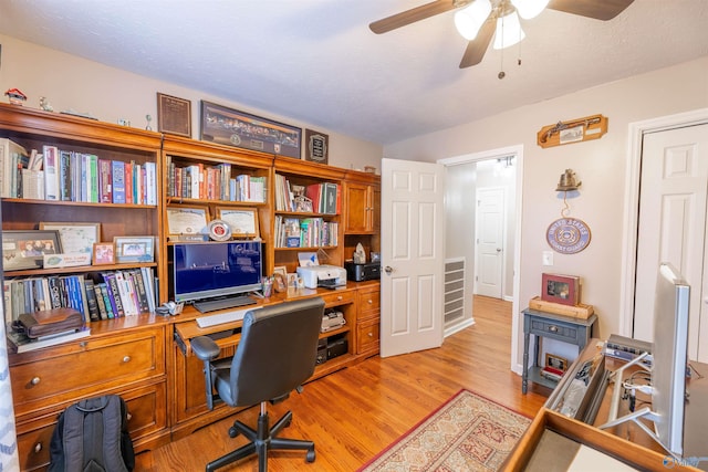 office featuring light hardwood / wood-style flooring and ceiling fan