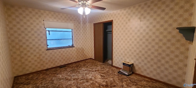 unfurnished bedroom featuring ceiling fan