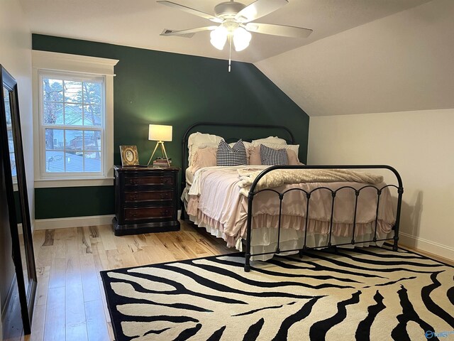 620 County Road 40, Centre, AL 35960 - bedroom with a ceiling fan, lofted ceiling, baseboards, and light wood finished floors