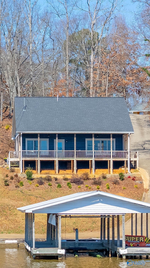 620 County Road 40, Centre, AL 35960 - country-style home featuring a water view, roof with shingles, and a boat dock