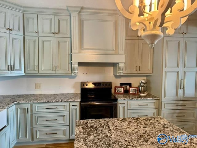 620 County Road 40, Centre, AL 35960 - kitchen featuring under cabinet range hood, black range with electric stovetop, hanging light fixtures, light stone countertops, and custom range hood