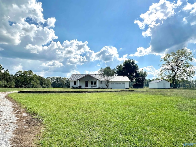 view of yard with a garage