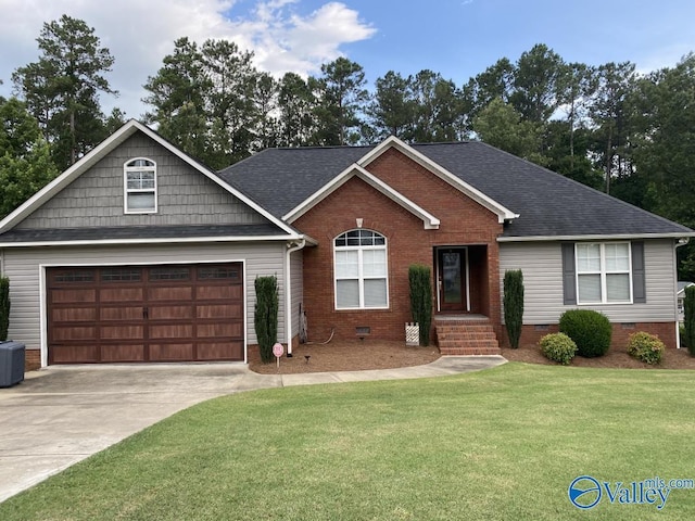 2451 Cedar Ridge Cir, Hokes Bluff, AL 35903 - view of front of house featuring crawl space, a front lawn, concrete driveway, and roof with shingles