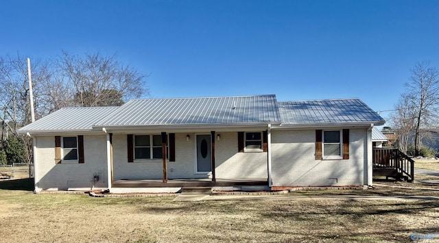 212 Nelson St NW, Hartselle, AL 35640 - view of front of home featuring a porch and a front yard