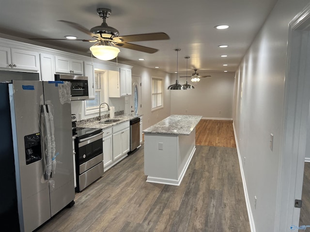 212 Nelson St NW, Hartselle, AL 35640 - kitchen featuring light stone countertops, sink, white cabinetry, and stainless steel appliances