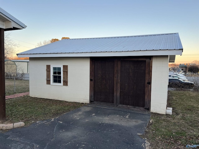 212 Nelson St NW, Hartselle, AL 35640 - view of outdoor structure at dusk