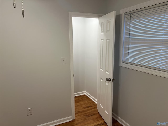 212 Nelson St NW, Hartselle, AL 35640 - hallway featuring hardwood / wood-style floors