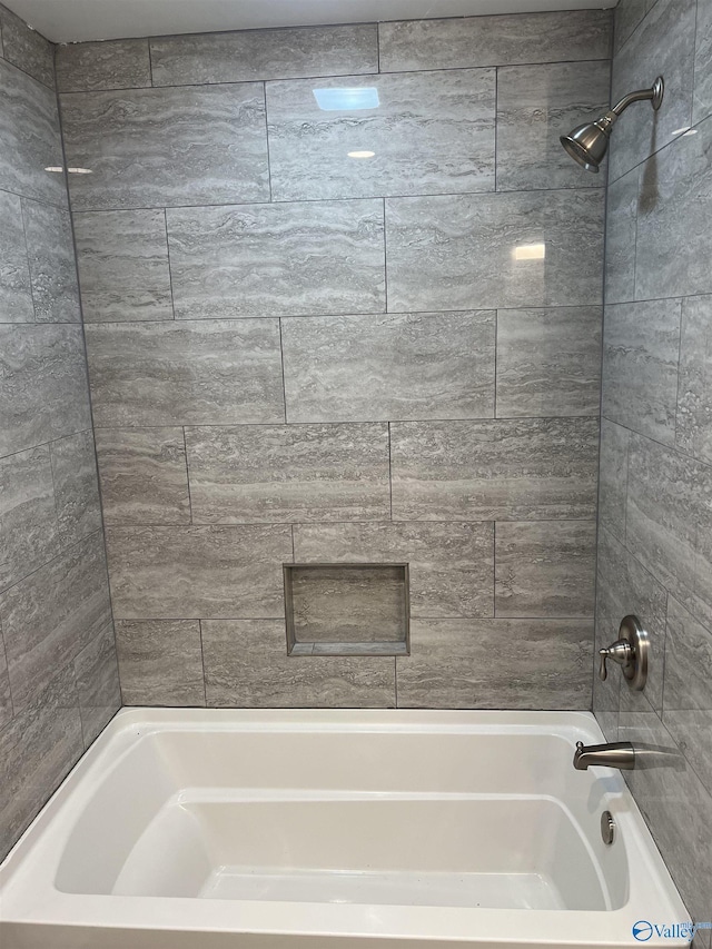 212 Nelson St NW, Hartselle, AL 35640 - bathroom featuring shower / bathtub combination