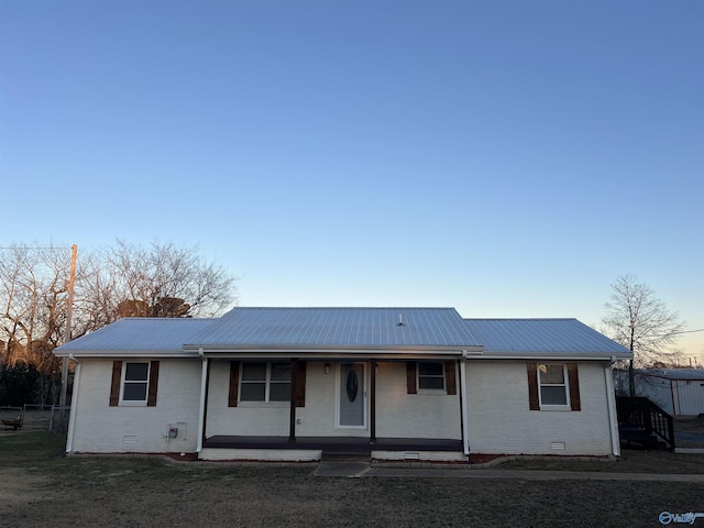 view of front of property featuring covered porch