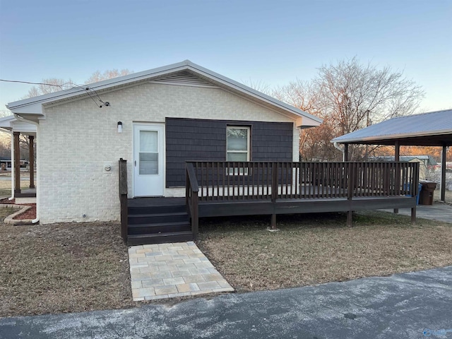 212 Nelson St NW, Hartselle, AL 35640 - back of house with a deck