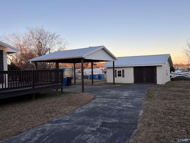 212 Nelson St NW, Hartselle, AL 35640 - exterior space featuring a carport