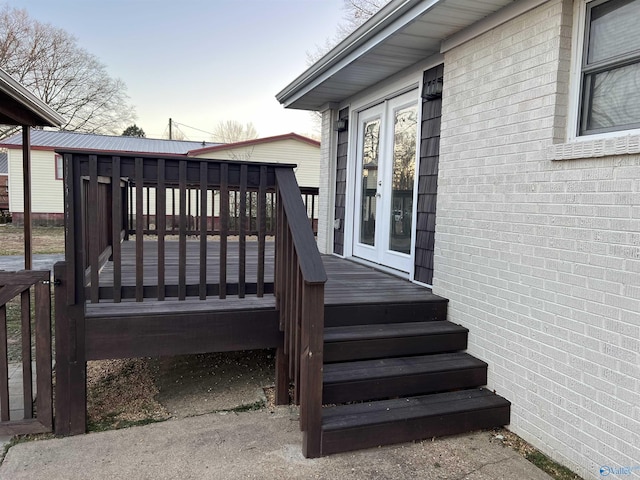212 Nelson St NW, Hartselle, AL 35640 - wooden deck with french doors