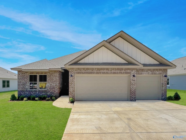 view of front of home featuring a garage and a front lawn