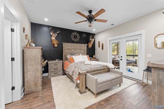 bedroom with access to exterior, french doors, hardwood / wood-style flooring, and ceiling fan