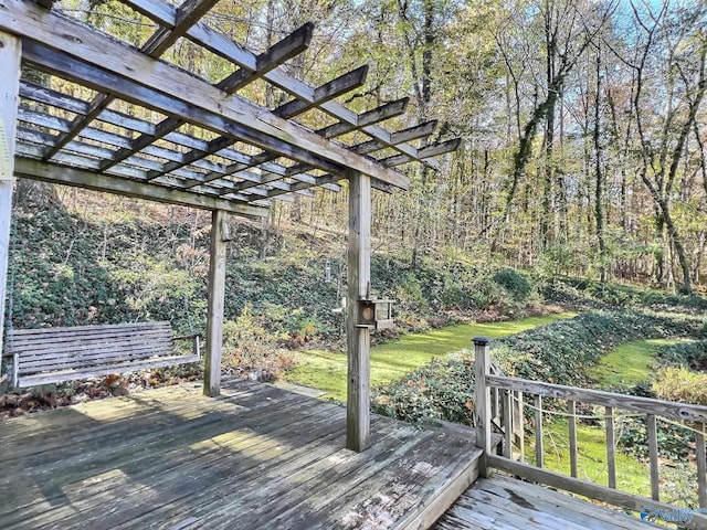 wooden terrace featuring a pergola