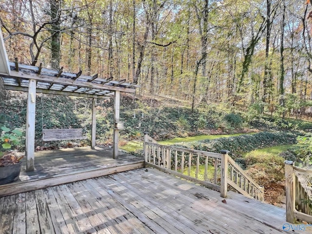 wooden terrace with a pergola