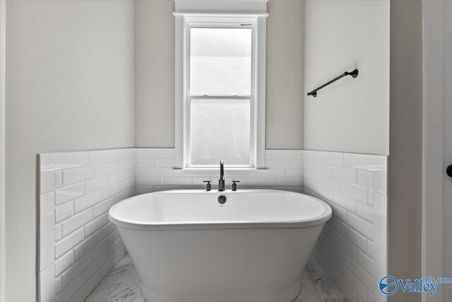 bathroom featuring tile walls and tile patterned flooring