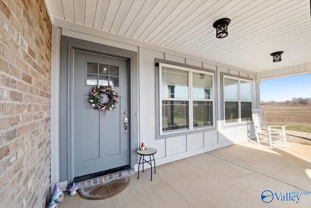 property entrance with a porch