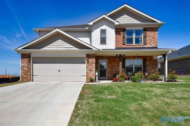 traditional-style home with an attached garage, covered porch, brick siding, concrete driveway, and a front yard