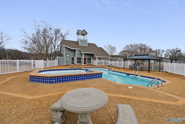 view of swimming pool featuring a gazebo