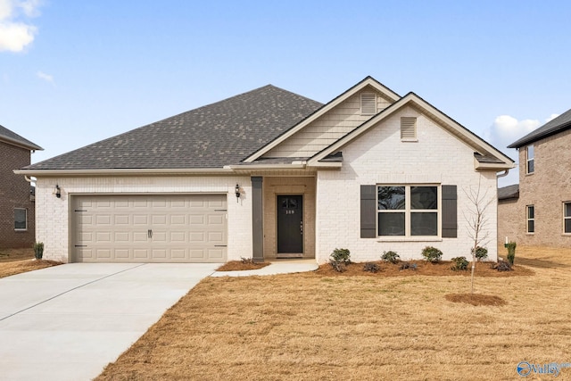 189 Saddle St, New Market, AL 35761 - view of front of property featuring an attached garage, brick siding, concrete driveway, roof with shingles, and a front yard