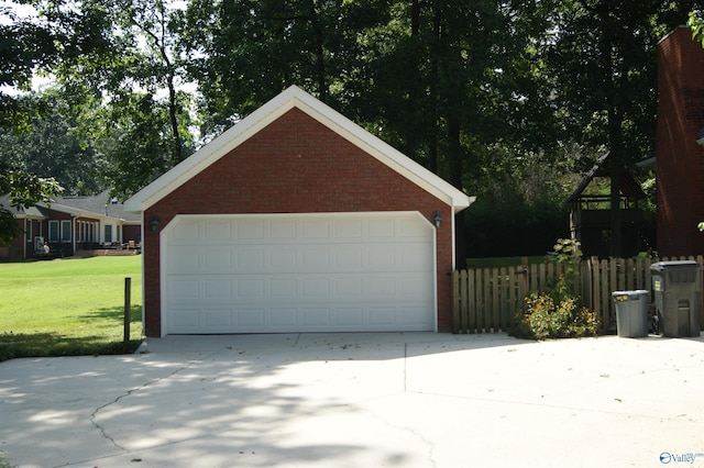 garage featuring fence