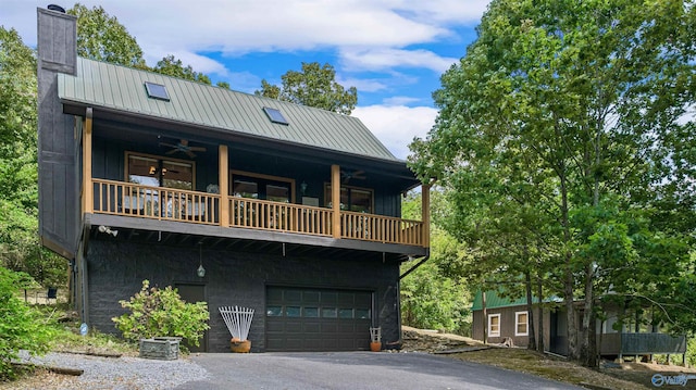 view of front of house featuring cooling unit and a garage