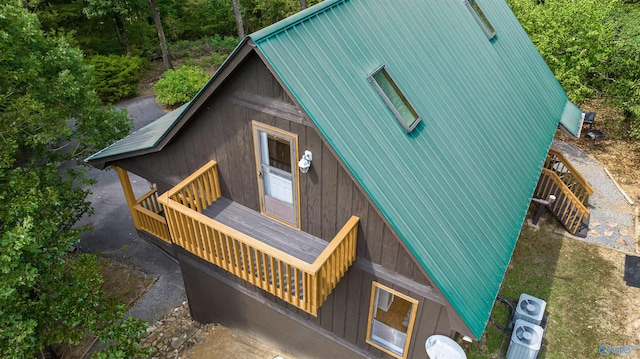 exterior space featuring central air condition unit