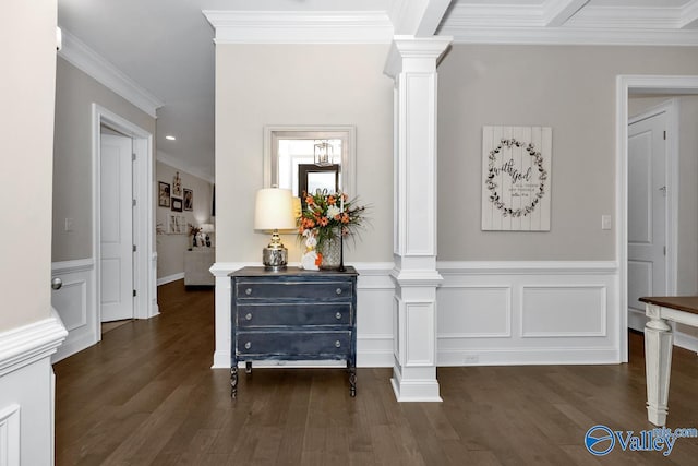 hallway featuring ornamental molding, dark hardwood / wood-style flooring, decorative columns, and beamed ceiling