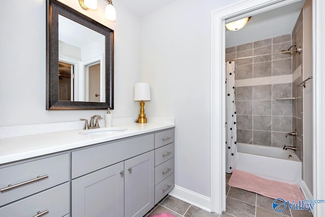 bathroom featuring shower / tub combo with curtain, vanity, and tile patterned flooring