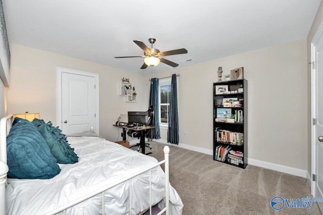 carpeted bedroom with ceiling fan