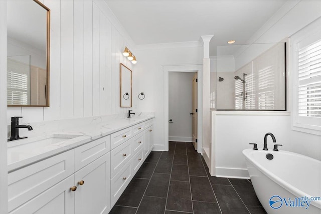 full bathroom with a sink, a soaking tub, tile patterned floors, a stall shower, and crown molding