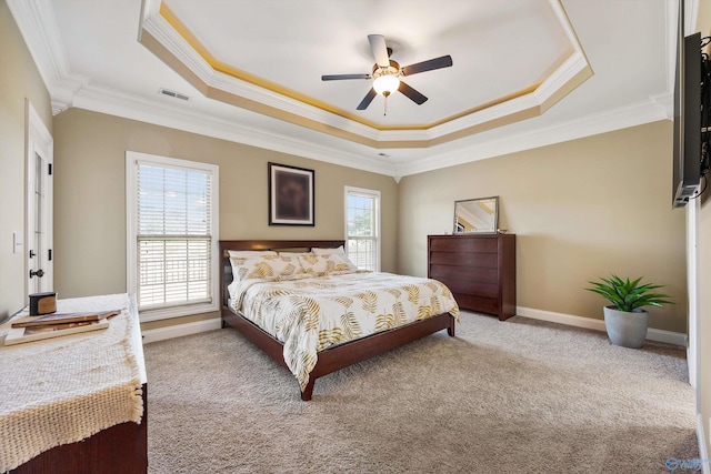 225 Nettles Dr NW, Madison, AL 35757 - bedroom featuring ornamental molding, a raised ceiling, carpet floors, baseboards, and ceiling fan