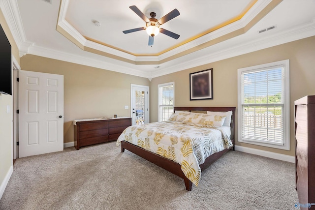 225 Nettles Dr NW, Madison, AL 35757 - carpeted bedroom with crown molding, a raised ceiling, baseboards, and ceiling fan