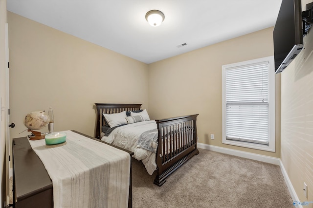 225 Nettles Dr NW, Madison, AL 35757 - bedroom featuring carpet flooring and baseboards