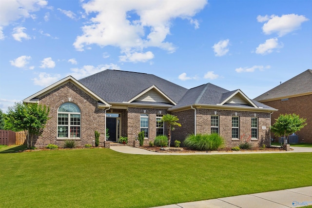 225 Nettles Dr NW, Madison, AL 35757 - view of front of house featuring brick siding and roof with shingles