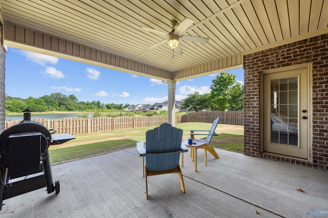 225 Nettles Dr NW, Madison, AL 35757 - view of patio with a ceiling fan and a water view