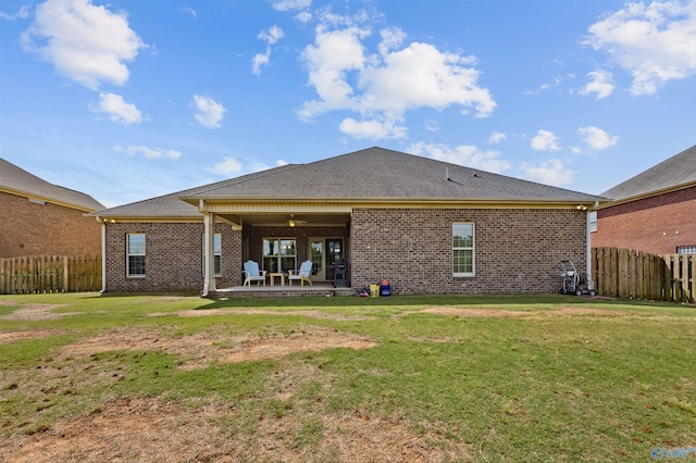 225 Nettles Dr NW, Madison, AL 35757 - rear view of house featuring ceiling fan, a patio, and brick siding
