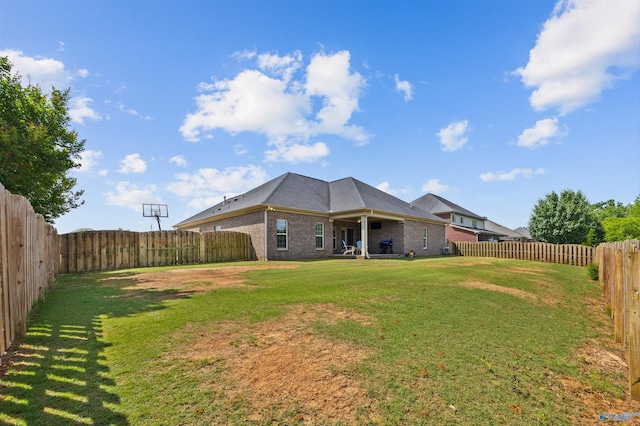 225 Nettles Dr NW, Madison, AL 35757 - back of house featuring brick siding