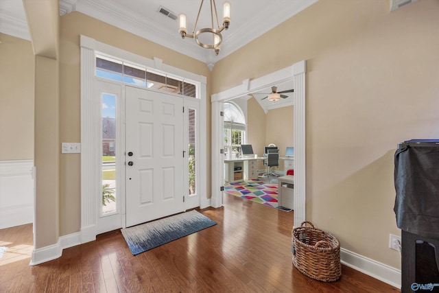 225 Nettles Dr NW, Madison, AL 35757 - entryway with ornamental molding, a chandelier, hardwood / wood-style flooring, and baseboards