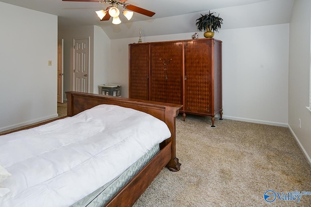 bedroom featuring ceiling fan and light colored carpet