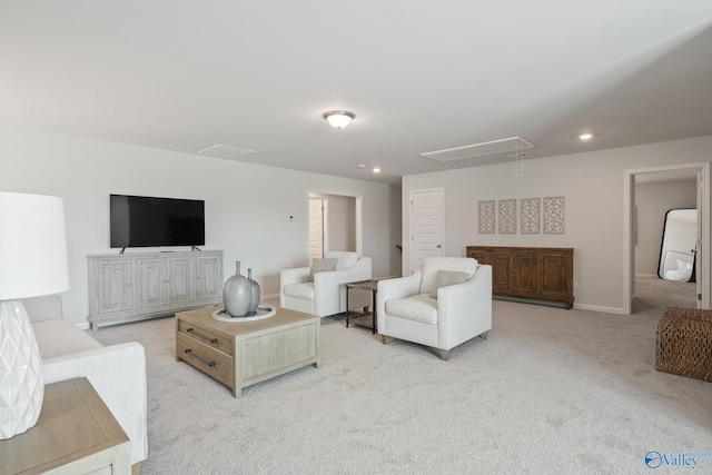 living room featuring light carpet