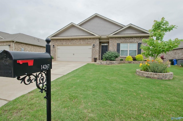 14267 Leadenhall Ln, Athens, AL 35613 - view of front of home with a garage, driveway, brick siding, and a front yard