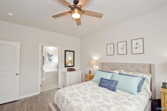 14267 Leadenhall Ln, Athens, AL 35613 - bedroom featuring wood finished floors, ensuite bathroom, baseboards, and a ceiling fan