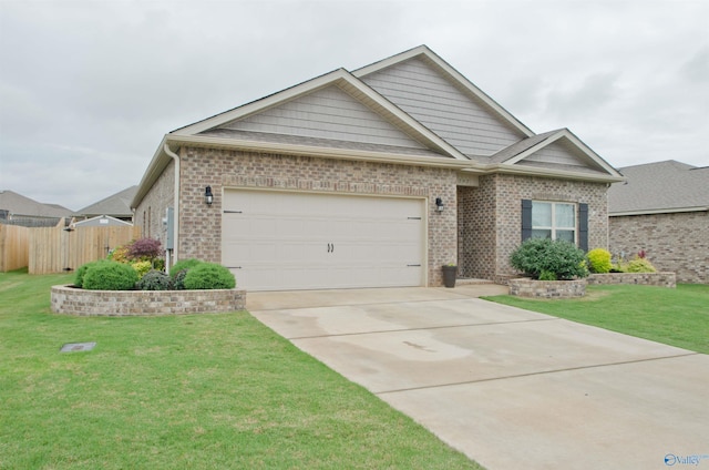 14267 Leadenhall Ln, Athens, AL 35613 - view of front of property featuring driveway, brick siding, and an attached garage